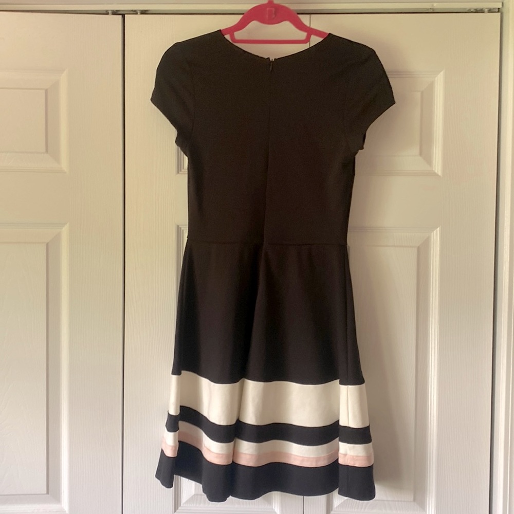 Fitted black dress with with and pink stripes